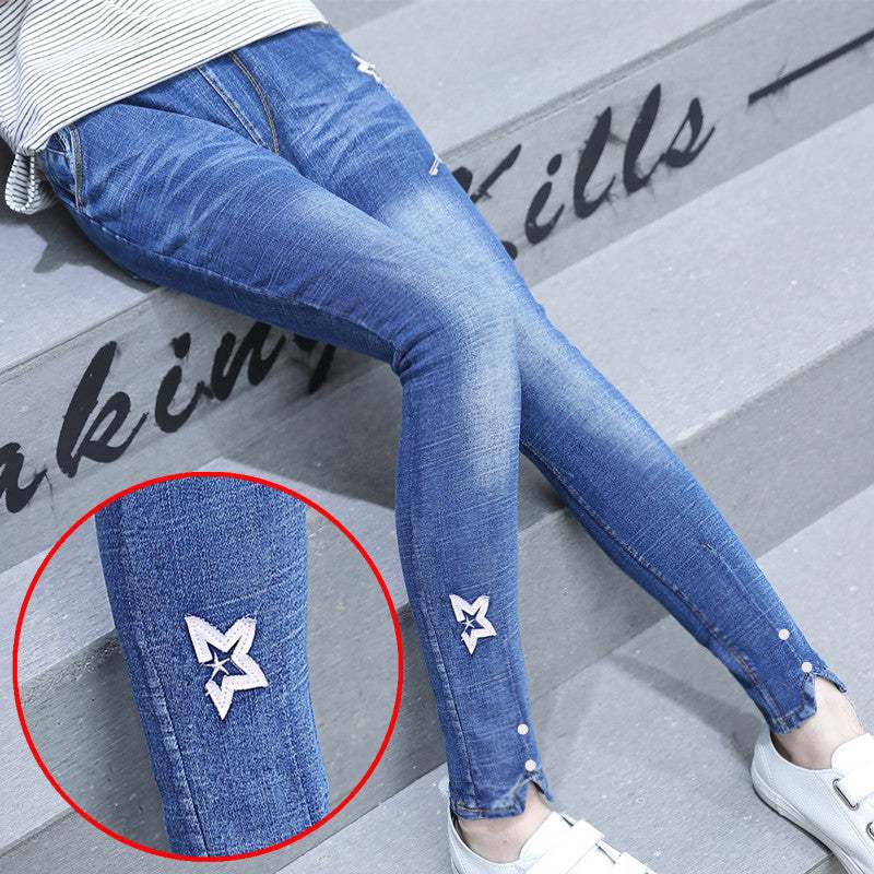 Korean children's spring fashion star skinny jeans for girls.