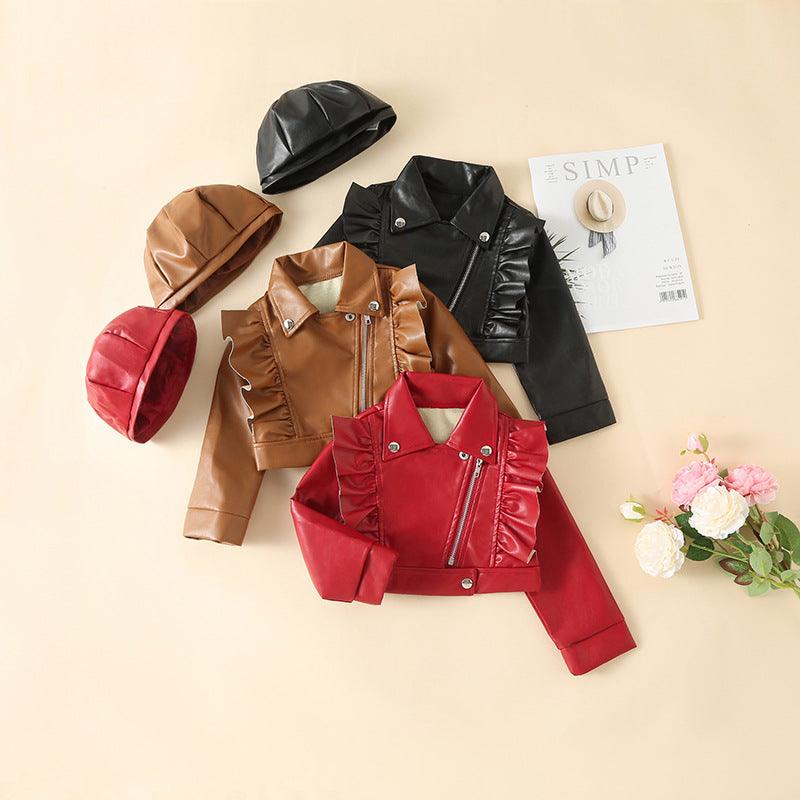 Girls short ruffle leather jackets in black, red, and brown with detachable caps displayed on a beige background.
