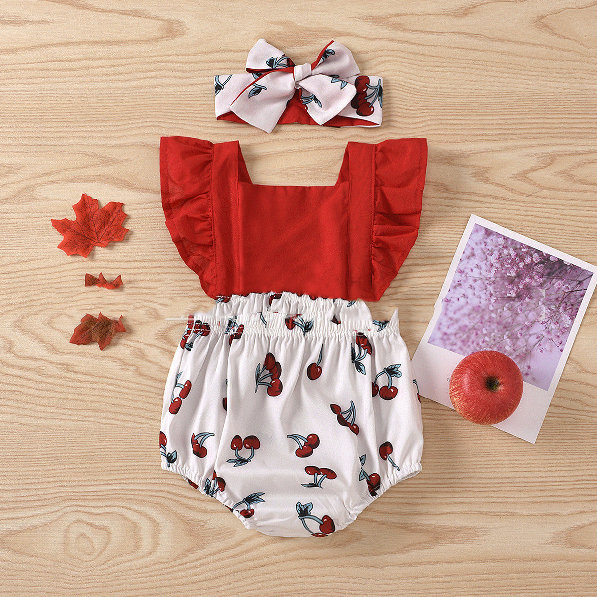Summer sleeveless cherry print romper with lace-up back and matching hair band.