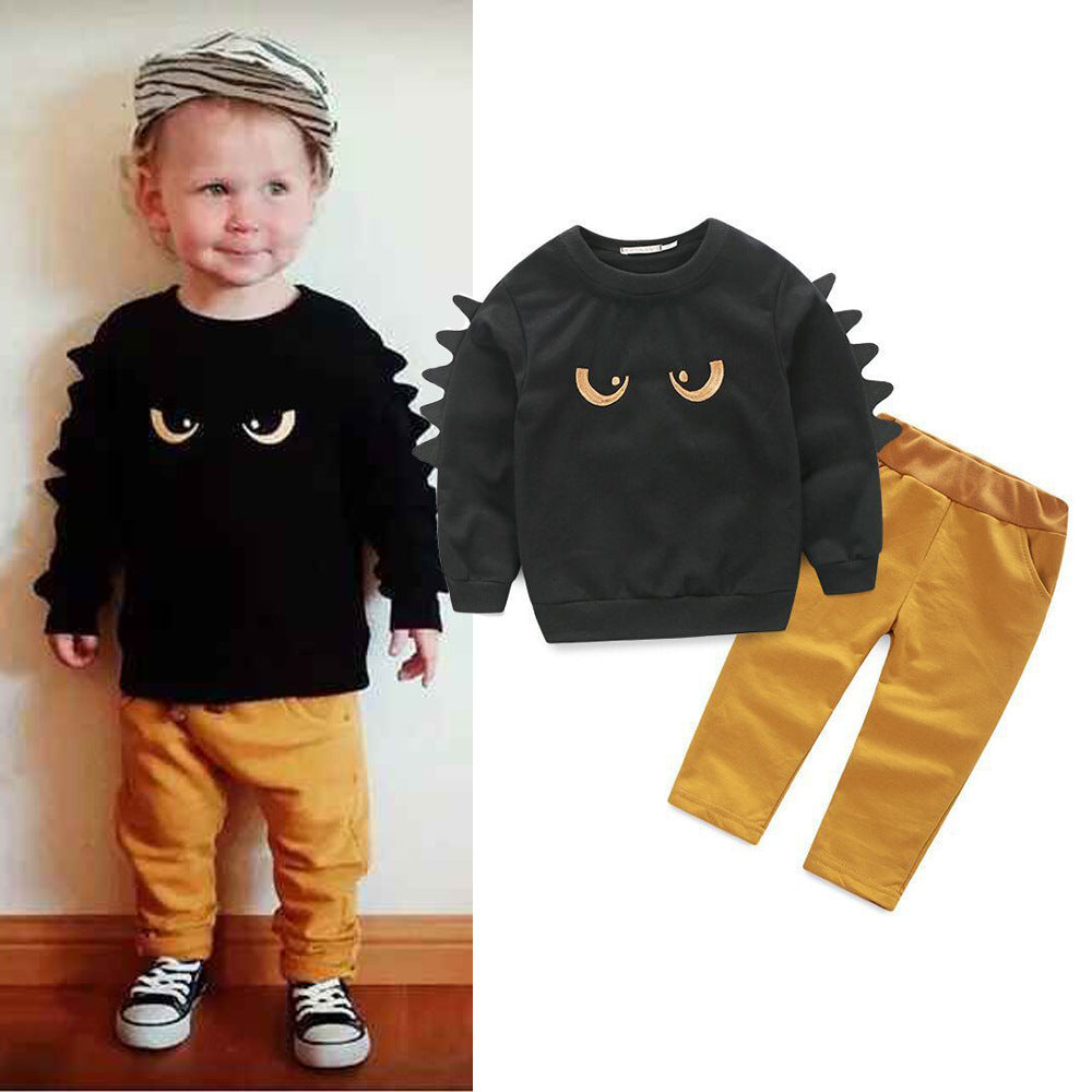 Fashion boy sweatshirt and pants set with black top, animal cartoon pattern, mustard trousers, suitable for children aged 3-8.