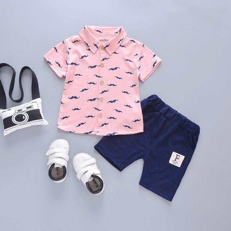 Boys Mustache Set with short sleeve shirt and shorts, featuring a mustache print and accessories.