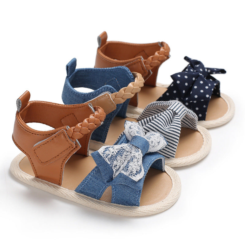 Braid strap silicone non-slip baby girl sandals with dark blue dots, blue stripes, light blue bow, Velcro closure.