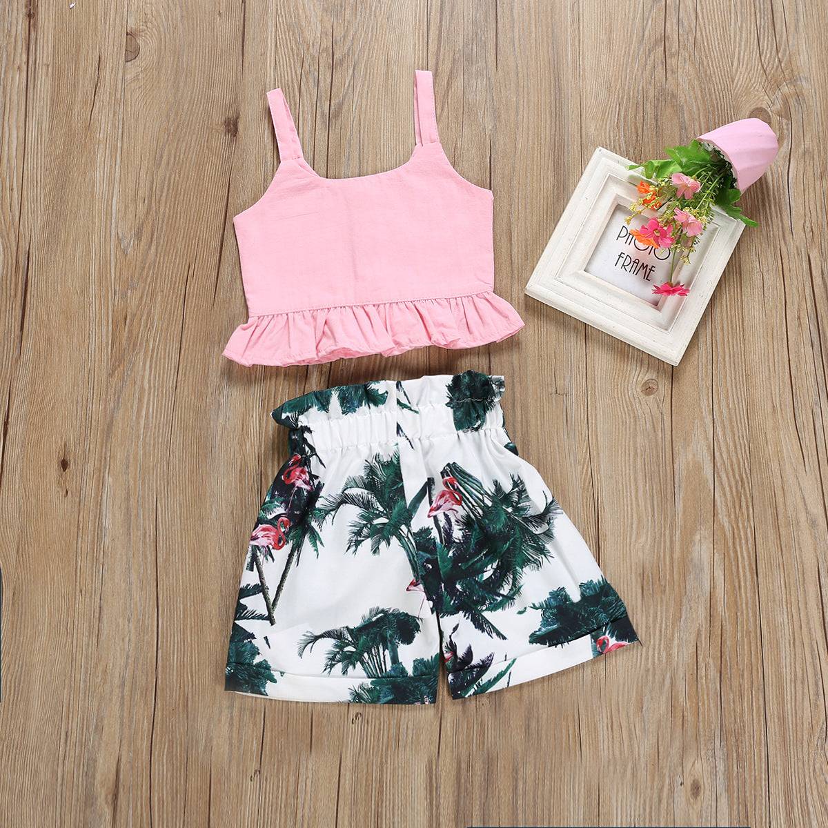 Children's ruffled set with pink top and maple flamingo print shorts.