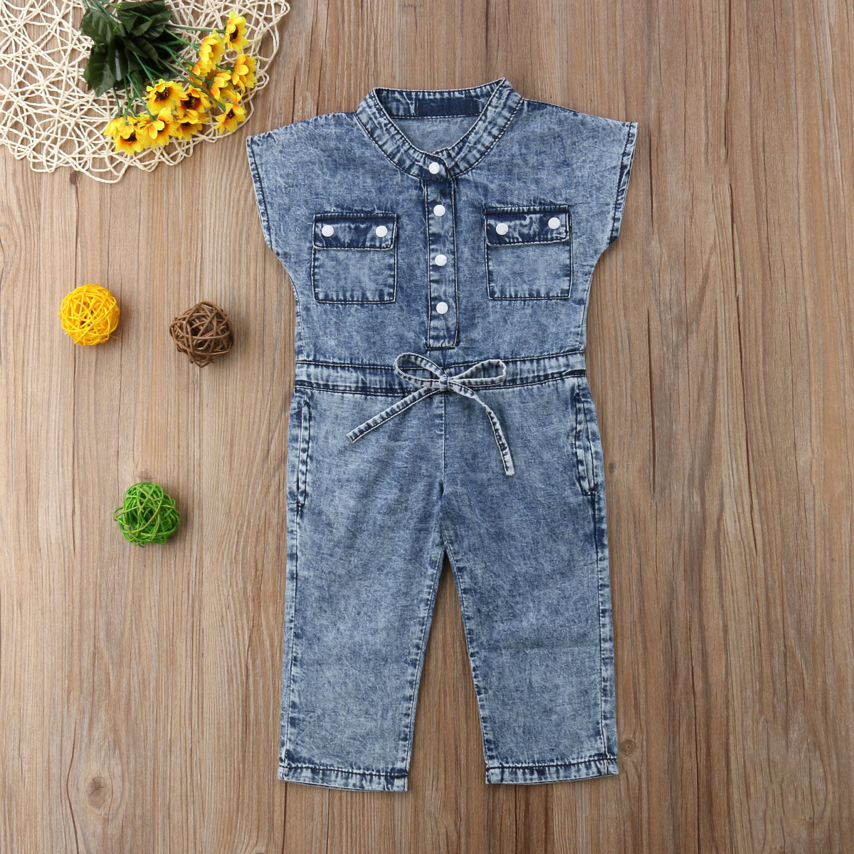 Girls denim short sleeve romper pants jumpsuit in dark blue cotton, casual style.