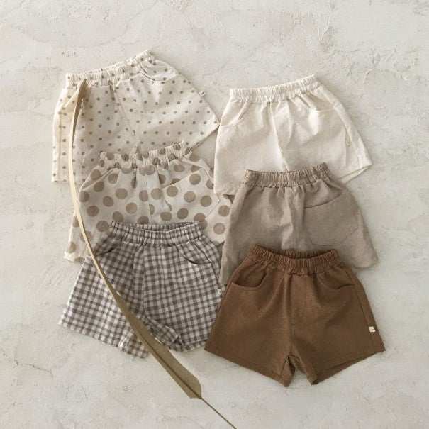 Summer baby linen casual shorts in various colors and patterns, suitable for infants aged 1-3.