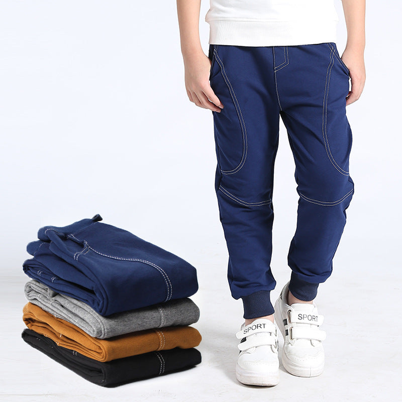 Boys sports trousers in Korean style with multiple colors displayed, emphasizing comfort and fit for active wear.