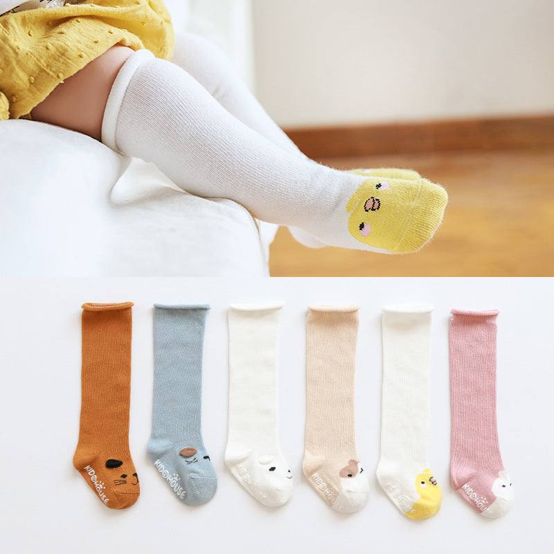 Cute cotton knee high anti-slip socks for newborns, featuring animal designs like yellow duck and white bear, available in various colors and sizes.