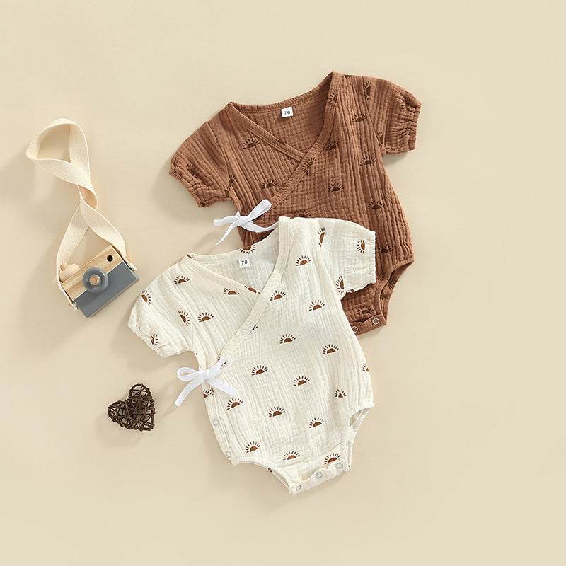 Toddler kids vacation bodysuit onesie in brown and apricot, short-sleeved, knitted cotton fabric.