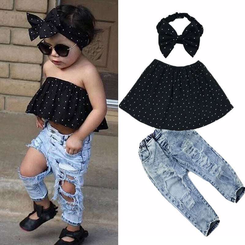 Girls off shoulder polka dot top with distressed jeans and matching headband set.