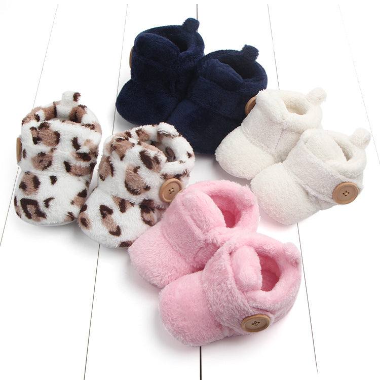 Baby soft soled fur booties in various colors for winter warmth.