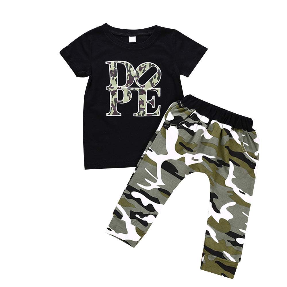 Camouflage toddler two-piece set with black short-sleeve blouse featuring "DOPE" lettering and matching camo pants.
