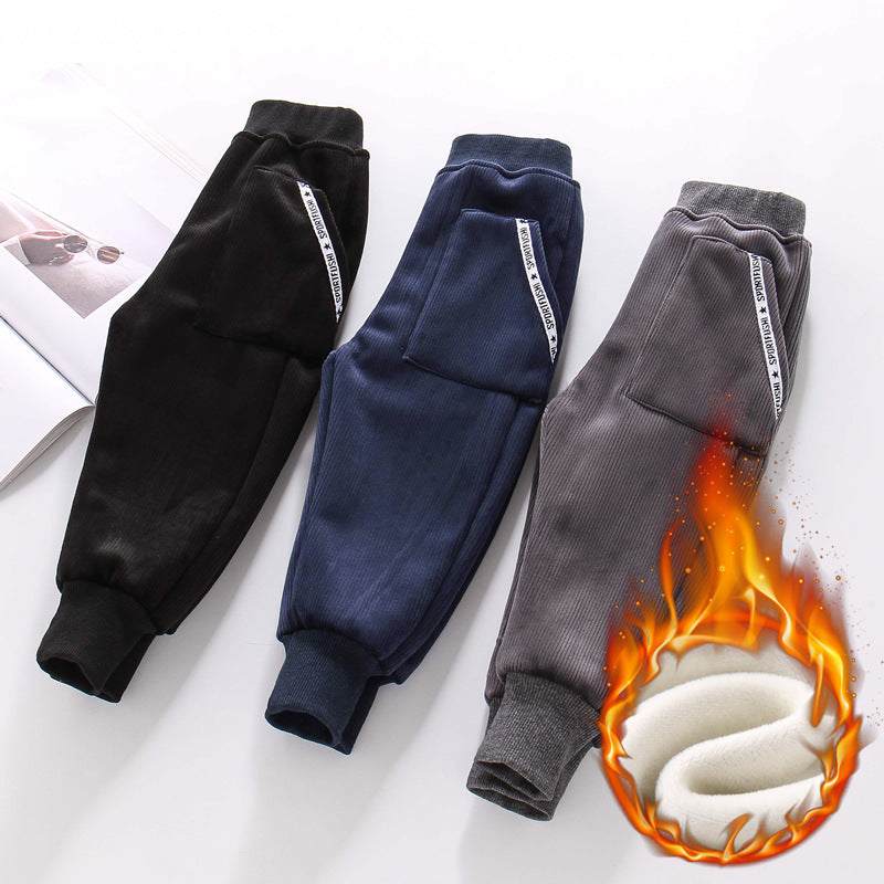 Boys fleece pants in black, blue, and gray with soft lining, suitable for children aged 3-8, ideal for autumn and winter.