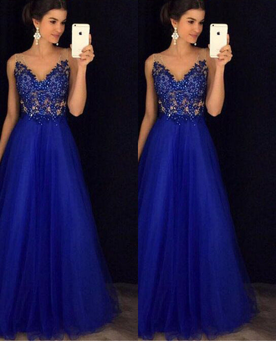 Blue backless beaded ball gown with elegant long design.