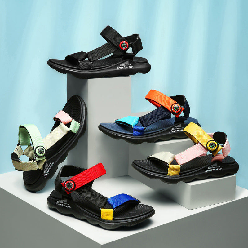Candy Color Kids Beach Sandals in various colors on display set against a blue background.