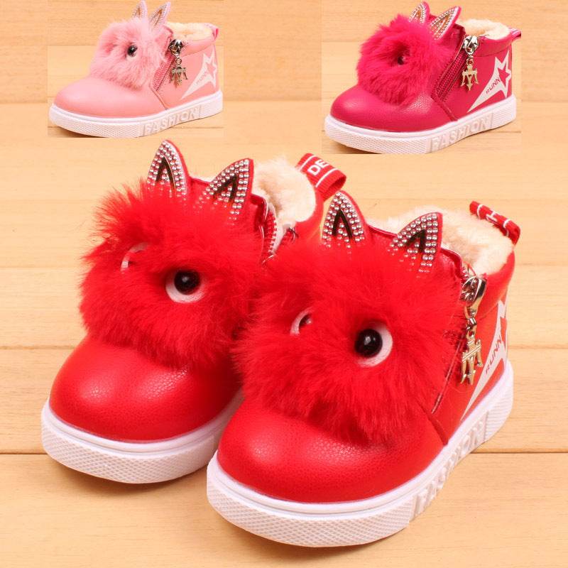 Girls red and pink cartoon face snow boots with fluffy detailing and side zipper.