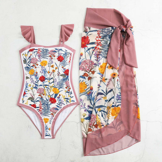 Girls one-piece swimming suit with floral print and matching bottom cover, available in green, blue, and pink, sizes S to XL.