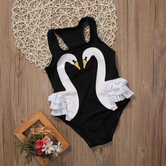 Sling Wave Swan One Piece Swimsuit with swan design and white ruffles, perfect for children aged 2 to 11.