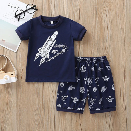 Kids Rocket Boy two-piece dark blue cotton short set with cartoon rocket and space theme design.